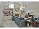 Spacious living room with vaulted ceiling, fireplace, and built-in shelving at 365 Pendleton Trl, Tyrone, GA 30290