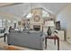Spacious living room with vaulted ceiling, fireplace, and built-in shelves at 365 Pendleton Trl, Tyrone, GA 30290