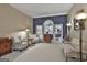 Cozy sitting room featuring a comfy couch and two armchairs at 365 Pendleton Trl, Tyrone, GA 30290