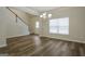 Bright dining room with hardwood floors and access to entryway at 105 Wyonia Way, Fayetteville, GA 30215