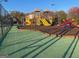 Community playground with play structures at 5165 Tussahaw Xing, Mcdonough, GA 30252