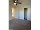 Bright bedroom with carpet, ceiling fan and double door closet at 4756 Manly, Stone Mountain, GA 30088