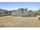 House backyard with deck and grassy area at 100 Roxbrough Ln, Fayetteville, GA 30215