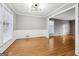 Spacious dining room featuring hardwood floors and neutral walls at 2667 Fieldstone Se Dr, Conyers, GA 30013