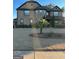 Two-story brick home with a large front yard and attached garage at 2801 Karras Cv, Hampton, GA 30228
