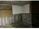 Unfinished basement with exposed walls and flooring at 146 Scarsdale Dr, Riverdale, GA 30274