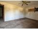 Spacious living room featuring hardwood floors and a ceiling fan at 146 Scarsdale Dr, Riverdale, GA 30274