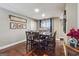 Dining room with hardwood floors and a table for six at 153 Stone Creek Dr, Dallas, GA 30157