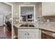 Kitchen with granite countertops and a view to living room at 153 Stone Creek Dr, Dallas, GA 30157