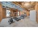 Partially finished basement with exercise equipment at 119 Griffin Way, Canton, GA 30115