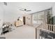 Bright Bedroom with crib, dresser, and window seating at 119 Griffin Way, Canton, GA 30115