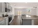 Kitchen features granite countertops and stainless steel appliances at 548 Whitman Ln # 13, Stockbridge, GA 30281