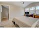 Bright bedroom with a comfy bed, workspace, and access to attic at 480 Mitchell Rd, Covington, GA 30014