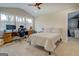 Bedroom with large windows and home office at 480 Mitchell Rd, Covington, GA 30014