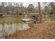 Covered boat dock on the lake with room for a boat and jet skis at 480 Mitchell Rd, Covington, GA 30014