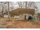 Covered boat storage with additional lumber at 480 Mitchell Rd, Covington, GA 30014