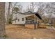 Modern lake house with spacious deck and wooded lot at 480 Mitchell Rd, Covington, GA 30014