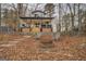 Lakefront home with expansive porch and firepit at 480 Mitchell Rd, Covington, GA 30014