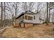 Lakefront home with modern design and elevated deck at 480 Mitchell Rd, Covington, GA 30014