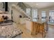 Modern kitchen with granite counters, stainless steel appliances, and an island at 480 Mitchell Rd, Covington, GA 30014