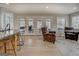 Open living space with comfortable seating and access to deck at 480 Mitchell Rd, Covington, GA 30014