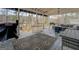 Relaxing screened porch with lake view, grill, and seating at 480 Mitchell Rd, Covington, GA 30014