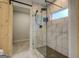 Modern shower with marble tile and glass enclosure at 480 Mitchell Rd, Covington, GA 30014