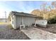 Gray exterior, boarded windows, and small deck at 2252 Brannen Se Rd, Atlanta, GA 30316