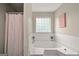 Relaxing bathroom featuring a garden tub and window at 4197 Arnolds Mill Opas, Douglasville, GA 30135