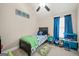 Cozy bedroom with a ceiling fan and window at 4197 Arnolds Mill Opas, Douglasville, GA 30135