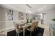 Modern dining room with a metallic table and upholstered chairs at 4197 Arnolds Mill Opas, Douglasville, GA 30135
