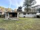 House with screened porch and grassy backyard at 2749 Williamsburg Dr, Decatur, GA 30034