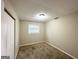 Simple bedroom with neutral walls and carpet at 2749 Williamsburg Dr, Decatur, GA 30034