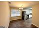 Eat-in kitchen with stainless steel appliances and light cabinetry at 2749 Williamsburg Dr, Decatur, GA 30034