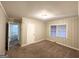 Spacious bedroom with neutral walls and carpeting at 2816 Cloverhurst Dr, East Point, GA 30344