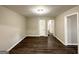Spacious living area with hardwood floors and neutral decor at 3029 Mckenzie Rd, East Point, GA 30344