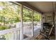 Wooden deck with seating area, providing backyard access at 75 Dunning Keep, Covington, GA 30016