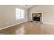 Living room features a stone fireplace and tile floors at 9200 Sunset Dr, Jonesboro, GA 30238