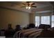Spacious bedroom with large bed and window at 732 Country Lake Drive Dr, Hampton, GA 30228