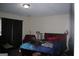 Bedroom with a queen-size bed and dark curtains at 732 Country Lake Drive Dr, Hampton, GA 30228