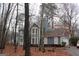 Two-story house with gray siding, attached garage, and landscaping at 732 Country Lake Drive Dr, Hampton, GA 30228