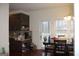 Kitchen with dark brown cabinets and a breakfast nook at 732 Country Lake Drive Dr, Hampton, GA 30228