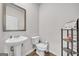 Clean and modern bathroom with pedestal sink at 4929 Calgary Dr, Douglasville, GA 30135