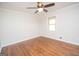 Bright bedroom with hardwood floors and window at 550 Davis Rd, Fayetteville, GA 30215