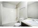 Clean bathroom with a shower/tub combo, toilet, and vanity with a sink at 4626 Derby Loop, Fairburn, GA 30213