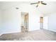 Primary bedroom with access to hallway bathroom and additional bedroom at 4626 Derby Loop, Fairburn, GA 30213