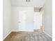 Bright bedroom with neutral walls and carpet, featuring two closets and a window at 4626 Derby Loop, Fairburn, GA 30213