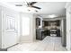 Kitchen with dark wood cabinets, tile backsplash, and stainless steel appliances at 4626 Derby Loop, Fairburn, GA 30213