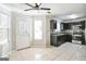 Kitchen with dark wood cabinets, tile backsplash, and stainless steel appliances at 4626 Derby Loop, Fairburn, GA 30213
