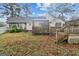 House backyard with deck,gazebo and vine covered walls at 3176 Pope Rd, Douglasville, GA 30135